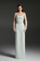 Elegant strapless lacquered brocade gown by I.H.F Studio featuring intricate patterns and a fitted silhouette.