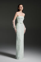 Elegant strapless lacquered brocade gown by I.H.F Studio featuring intricate fabric details and a sophisticated silhouette.