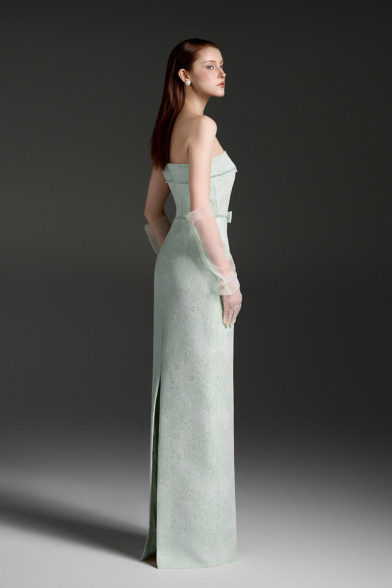 Elegant strapless lacquered brocade gown by I.H.F Studio featuring intricate fabric design and a fitted silhouette.