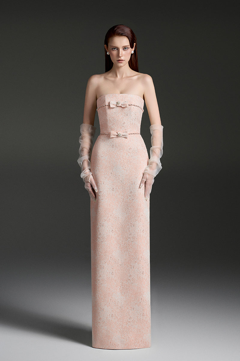 Elegant strapless lacquered brocade gown by I.H.F Studio featuring intricate fabric details and a fitted silhouette.