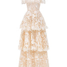 Ivory floral garden lace 3-tiered A-line gown by I.H.F Studio with intricate lace details and flowing silhouette.