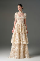 Ivory floral garden lace 3-tiered A-line gown by I.H.F Studio, featuring delicate lace details and a flowing silhouette.
