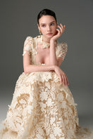 Ivory floral garden lace 3-tiered A-line gown by I.H.F Studio, detailed lace design with flowing layered skirt.