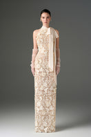 Ivory floral garden lace gown with long bow straps from I.H.F Studio featuring intricate lace details and elegant design.