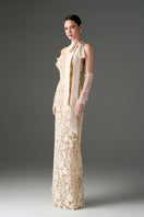 Ivory floral garden lace gown with long bow straps by I.H.F Studio, featuring intricate lace details and elegant design.