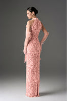 Light pink floral lace gown with long bow straps by I.H.F Studio, featuring intricate lace details and a flowing silhouette.