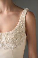 Ivory silk taffeta A-line gown with crystal embellishments, designed by I.H.F Studio, featuring a trapeze silhouette and elegant details.