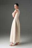 Ivory silk taffeta trapeze A-line gown by I.H.F Studio with crystal embellishments, elegant and flowing design.