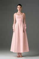 Light pink silk taffeta trapeze A-line gown with crystal embellishments by I.H.F Studio, flowing silhouette and elegant design.