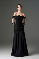 Black floral vine lace off-shoulder draped A-line gown by I.H.F Studio, featuring elegant lace details and flowing silhouette.