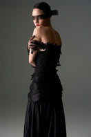 Black floral vine lace off-shoulder draped A-line gown by I.H.F Studio, featuring intricate lace details and elegant design.