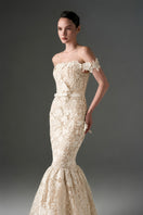 Ivory floral garden lace off-shoulder A-line gown by I.H.F Studio, featuring delicate lace details and elegant flowing design.