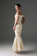Ivory floral garden lace off-shoulder A-line gown by I.H.F Studio featuring intricate lace details and elegant flowy design.