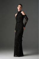 Black floral garden long-sleeve lace gown by I.H.F Studio featuring intricate lace details and elegant flowing fabric.