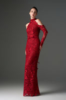 Red floral lace gown with long sleeves by I.H.F Studio, featuring intricate lace details and elegant flowing fabric.