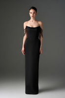 Black taffeta off-shoulder corset gown with embellishments by I.H.F Studio, featuring a fitted bodice and flowing skirt.