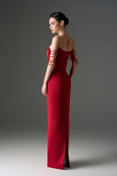 Red taffeta off-shoulder embellished gown by I.H.F Studio, featuring a fitted corset and flowing skirt.