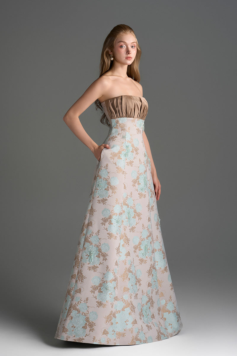Light blue and light brown floral brocade and silk taffeta A-line gown by I.H.F Studio with clustered brown and blue floral pattern.