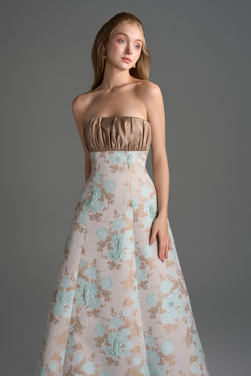 Light blue and light brown floral brocade and silk taffeta A-line gown by I.H.F Studio featuring clustered brown and blue floral patterns.