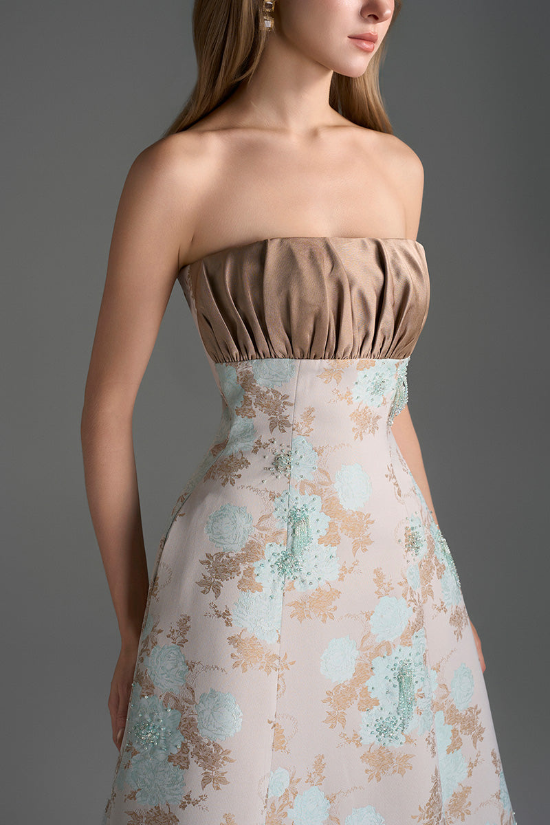 Light blue and light brown floral brocade and silk taffeta A-line gown by I.H.F Studio with clustered brown and blue floral pattern.