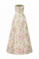 Light pink floral brocade and silk taffeta A-line gown by I.H.F Studio featuring clustered green and pink floral patterns.