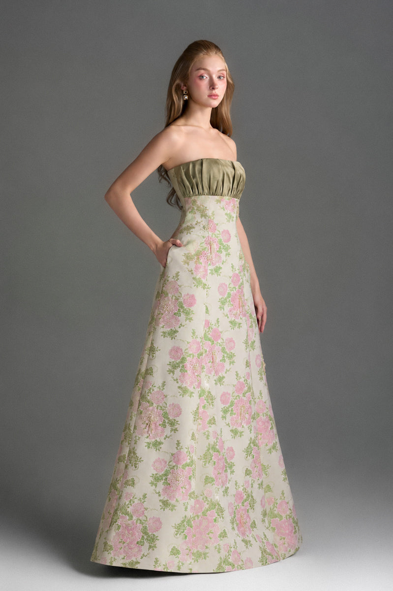 Light pink floral brocade and silk taffeta A-line gown by I.H.F Studio featuring clustered green and pink floral patterns.
