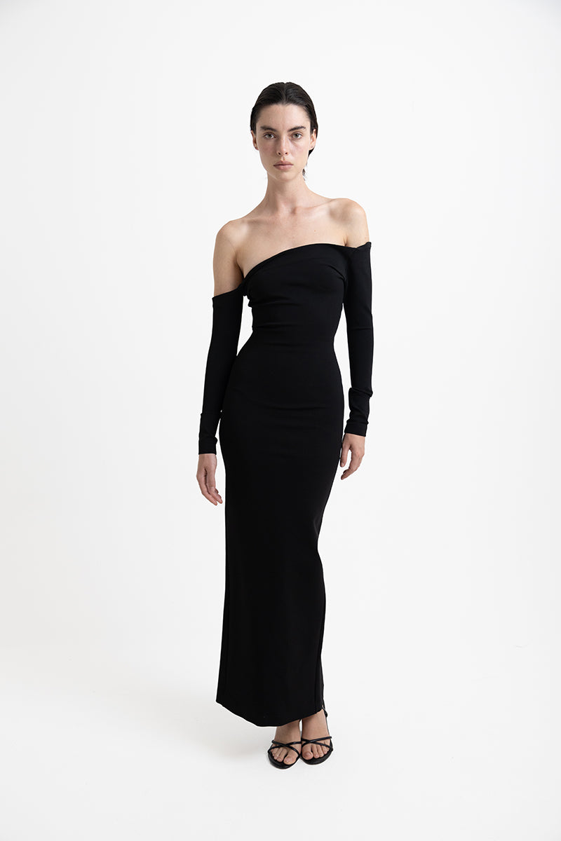 Junie Charlotte maxi dress shown in a flowing, stylish design with a fitted bodice and elegant length, perfect for summer outings.