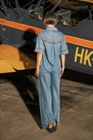 DUMA&CO Templo Shirt in a stylish design, displayed on a hanger with a close-up view of the fabric and collar details.
