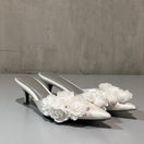 Christin Wu Camelia Cream Bloom Heels featuring blush pink floral design and elegant heel height, perfect for special occasions.