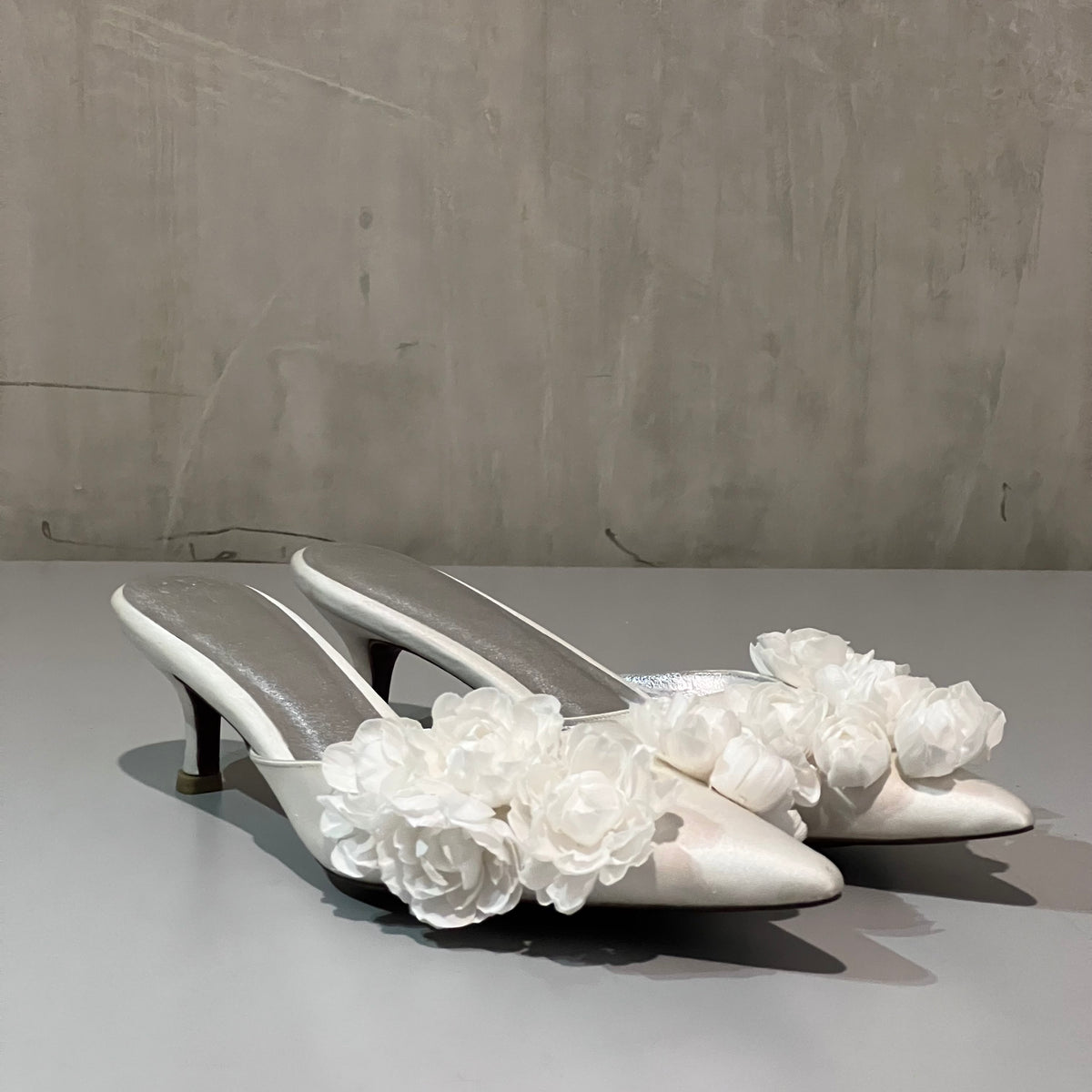 Christin Wu Camelia Cream Bloom Heels featuring blush pink floral design and elegant heel height, perfect for special occasions.