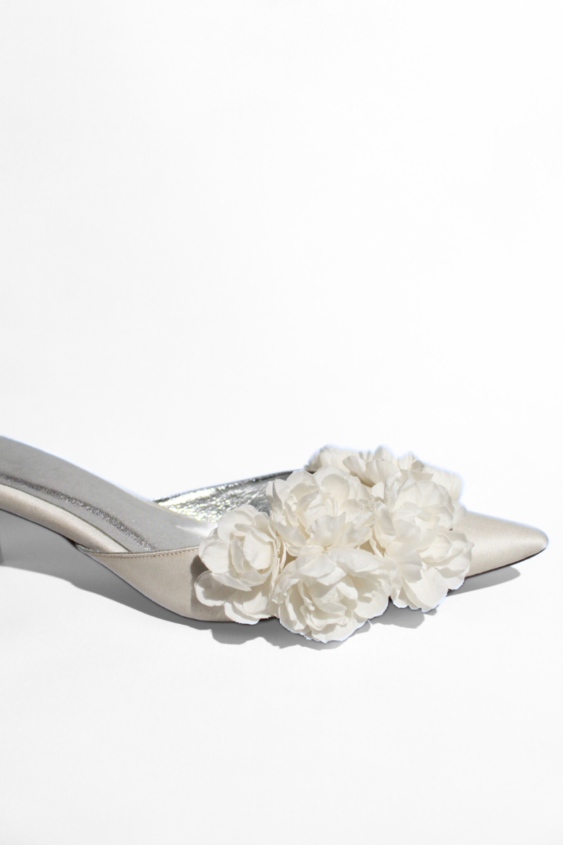 Christin Wu Camelia Cream Bloom heels with floral design, beige color, and elegant pointed toe for stylish occasions.