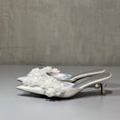 Christin Wu Camelia Cream Bloom Heels featuring elegant floral design and comfortable heel height, perfect for stylish occasions.