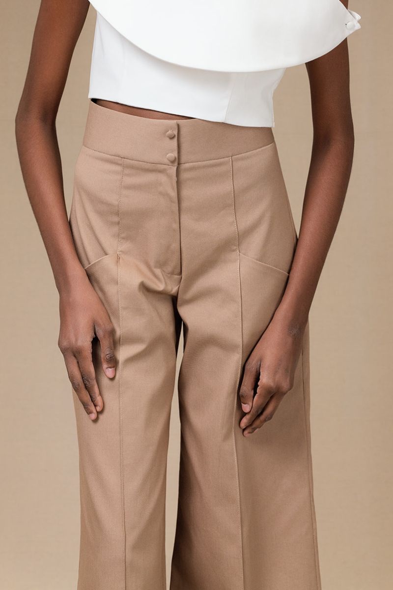Tan Pino pants from ANA + MARIA, featuring a stylish fit and fabric detail, shown in a high-quality product image.