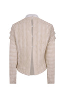 Back view of Lorena Saravia Catalina blouse, a stylish women's top with flowing fabric and elegant design.