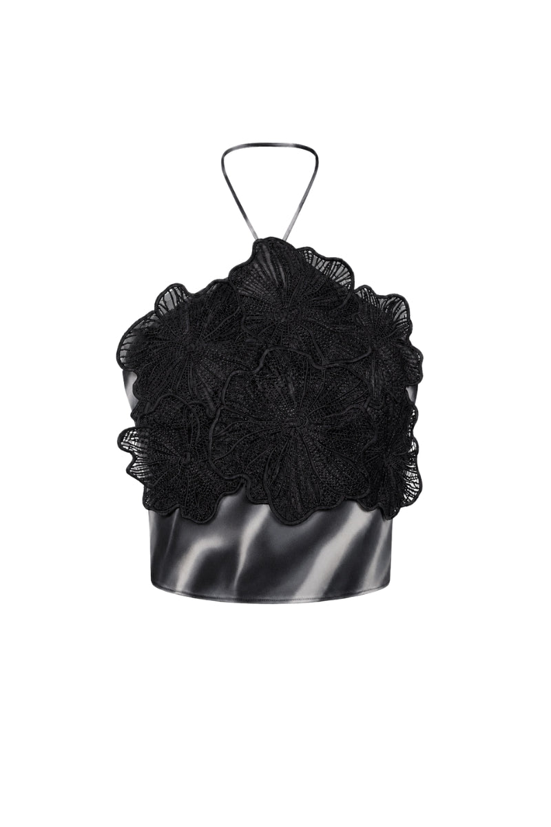 Black printed Cayena top by Tinta Latina, featuring a stylish design and comfortable fit, shown on a model.