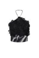 Black printed Cayena top by Tinta Latina, featuring a stylish design and comfortable fit, shown on a model.