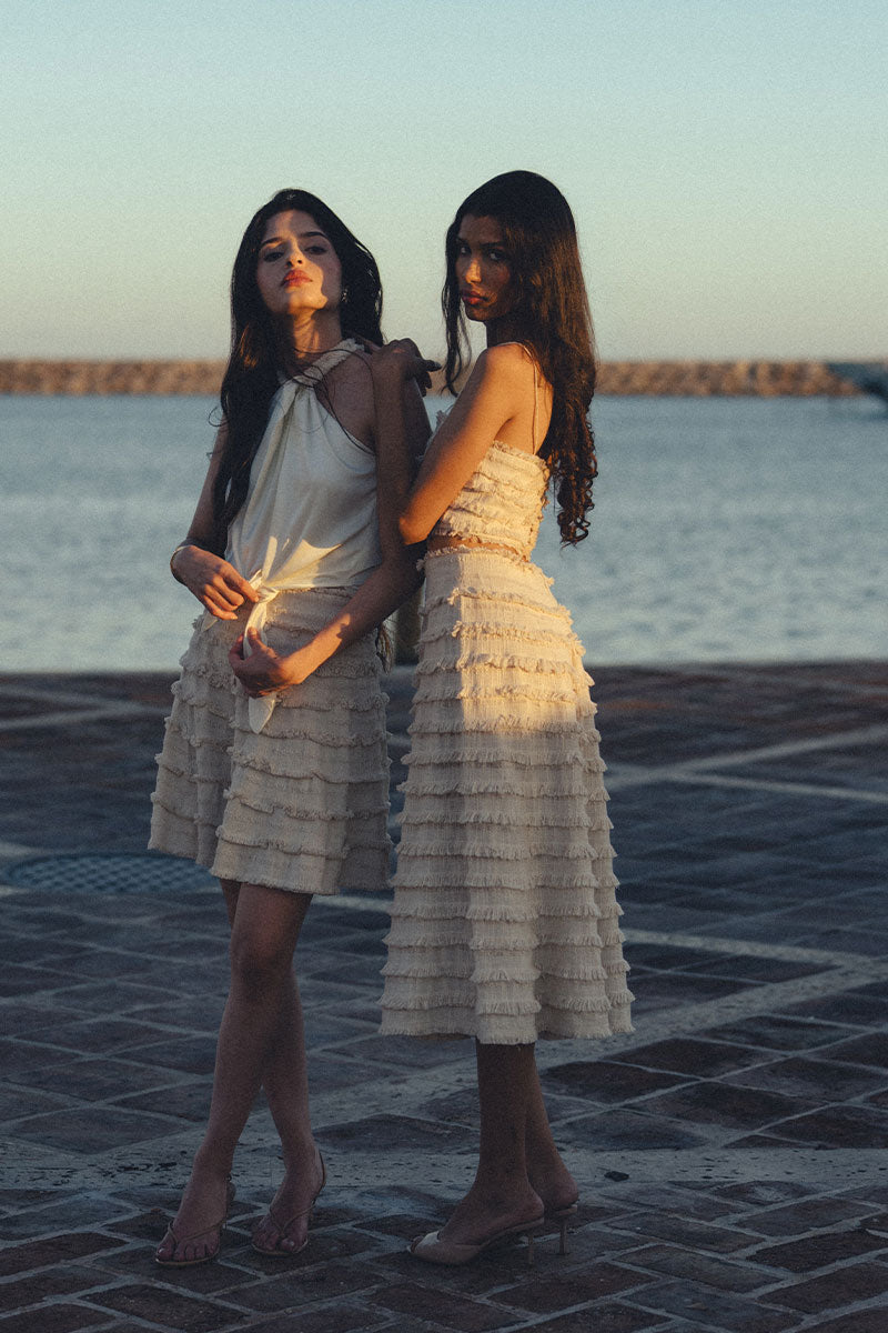 Maylé Vásquez Alya mini skirt in nature print, featuring a stylish and feminine design with a fitted waist and flowing hem.