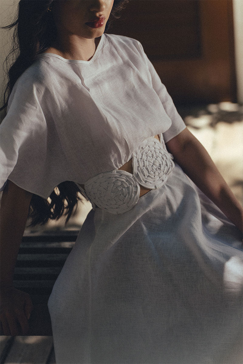 Elegant circle dress by Maylé Vásquez, showcasing flowing fabric and stylish design, perfect for formal occasions.