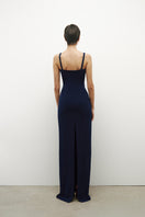 Long JC Pajares gown in double crepe fabric, featuring a flowing silhouette and handmade ceramic cups detail.