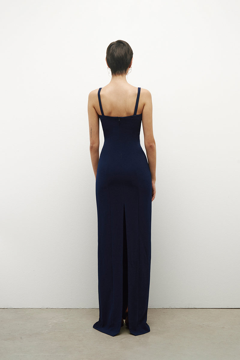 Long JC Pajares gown in double crepe fabric, featuring a flowing silhouette and handmade ceramic cups detail.