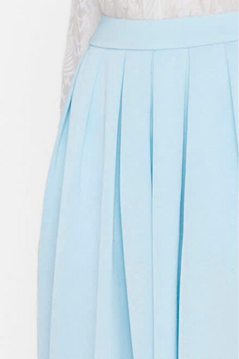Sky blue balloon pants by Valenciani featuring a relaxed, oversized fit and lightweight fabric for comfortable style.