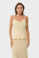 Cream niLuu Cowl Cami Top shown on a hanger with soft fabric and stylish drape. Perfect for casual or dressy outfits.