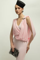 Jenny K Tran Celian gown in baby pink, elegant dress with flowing fabric and delicate design, perfect for special occasions.