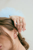 Silver CICLO ring by Eugenia Ospina featuring a sleek, modern design with a smooth, polished finish.