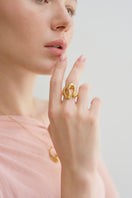 Gold Cielo ring by Eugenia Ospina featuring a sleek, minimalist design with a smooth, polished finish.