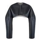 Black Adele bomber jacket by URA, featuring a stylish cropped design and ribbed cuffs, shown on a model.