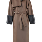 URA ADA camel coat displayed on a hanger with a classic design and warm fabric suitable for winter wear.