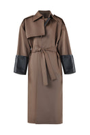 URA ADA camel coat displayed on a hanger with a classic design and warm fabric suitable for winter wear.