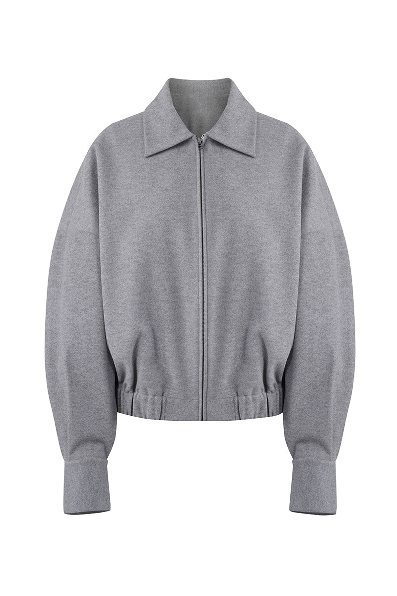 Gray Steph jacket by URA, featuring a stylish, fitted design with a front zipper and collar, displayed on a plain background.