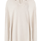Light ivory Alfie Cape shirt by URA featuring a flowing design and soft fabric, displayed on a hanger.